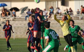 Guam take on Macau during the East Asian Cup.