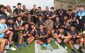The Fiji Bati celebrate with the Oceania Shield.