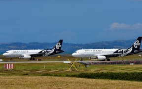 AUCKLAND, NEW ZEALAND - DECEMBER 17: Air New Zealand Airbus A320s taxiing at Auckland International Airport on December 17, 2017 in Auckland