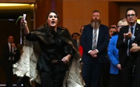 Australian Senator Lidia Thorpe disrupts proceedings as Britain's King Charles III and Queen Camilla attend a Parliamentary reception at Parliament House in Canberra on October 21, 2024. (Photo by LUKAS COCH / POOL / AFP)