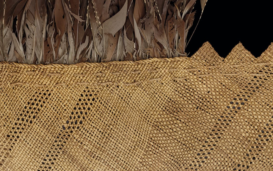 Makers unknown Te Rā [the sail] (detail) c. 1770–1800. Harakeke, kererū, kāhu and kākā feathers, dog skin. On loan from the Trustees of the British Museum. © Whakaarahia anō te rā kaihau Te Rā Project. Photo: Cultural Heritage Imaging