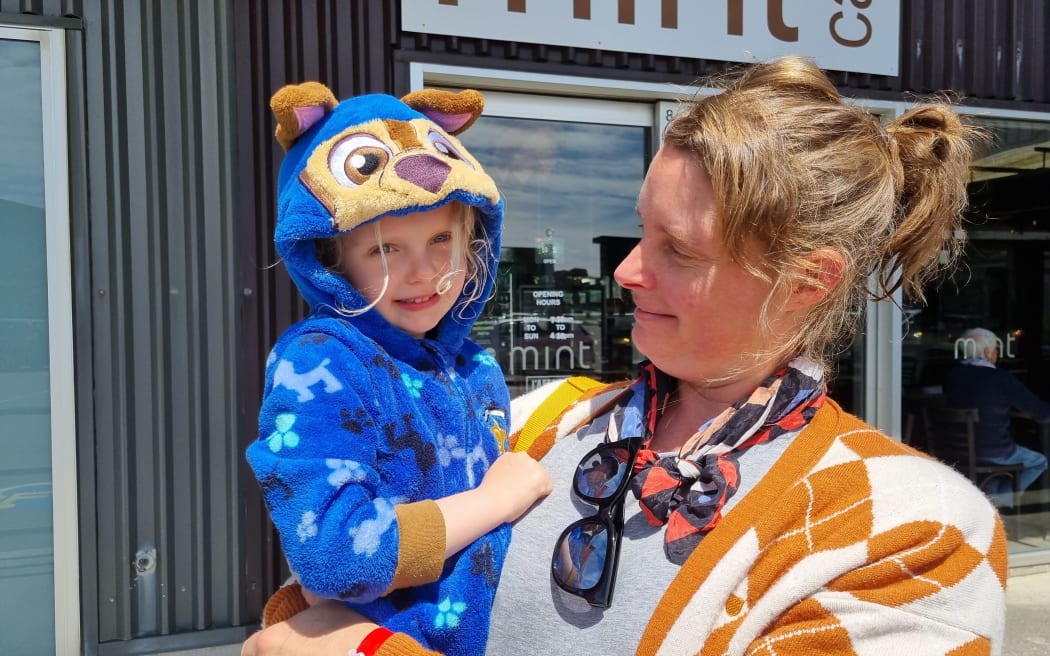 Erica van Zon with Maaike, whose Halloween costumes this year have included a ghost and Chase from Paw Patrol.