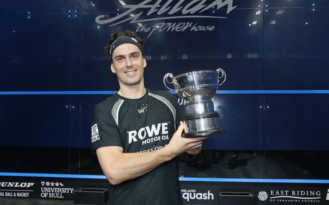 Winner of the British Open Men's title Paul Coll of New Zealand with the trophy. 2022.