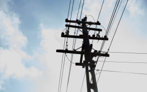 A silhouette of power lines.