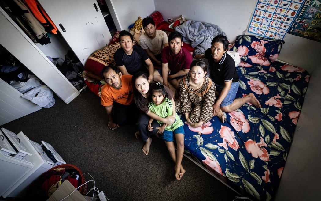 Some members of the group of Vietnamese migrants that paid thousands for work visas but arrived in NZ to non-existent jobs.