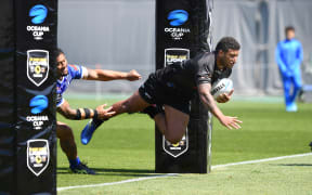 Viliame Kikau scores one of his two tries