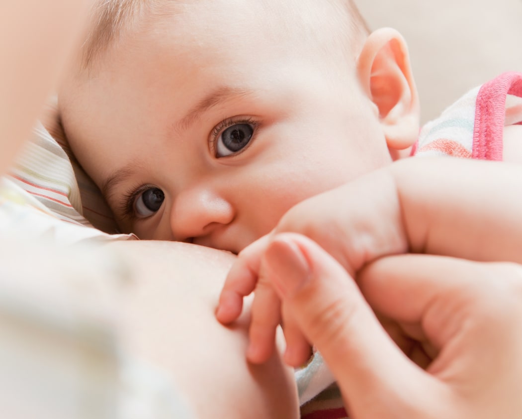 Breast feeding baby.