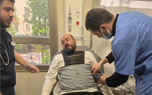 Hamdan Ballal receives treatment at a hospital in Hebron, in a photo shared on Instagram by Basel Adra. Instagram / Basel Adra