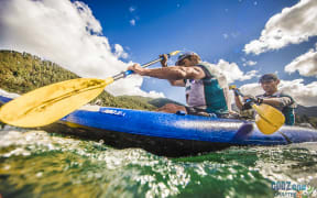 Richie McCaw and Rob Nichol on Lake Rotoroa during Godzone 2016.