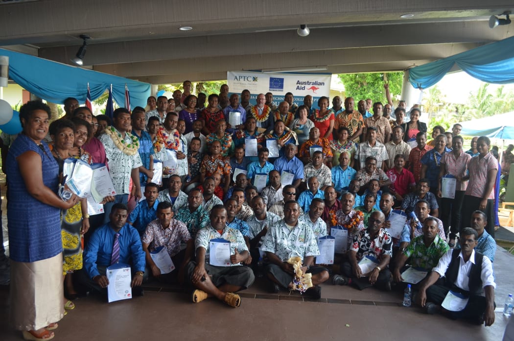 Fiji sugar industry workers pose for a group photo after their graduation in Nadi.