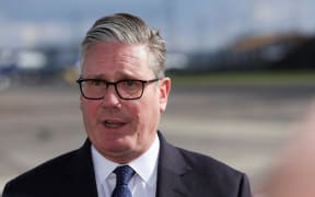 British Prime Minister Keir Starmer makes a statement, after he left the European Political Community summit (EPC), amid a reported attack in which a car was driven at pedestrians and a stabbing attack near a synagogue in north Manchester, at Copenhagen Airport, in Kastrup, Denmark, October 2, 2025. Starmer said he was "appalled" by an attack outside a synagogue in Manchester, as he cut short his attendance at a summit of European leaders. "The fact that this has taken place on Yom Kippur, the holiest day in the Jewish calendar, makes it all the more horrific," Starmer said in a statement on X. Starmer was leaving the European Political Community meeting in Copenhagen early to return to Britain to chair an emergency crisis meeting of his ministers, known as COBRA, a UK government official told AFP on condition of anonymity. (Photo by Suzanne Plunkett / POOL / AFP)