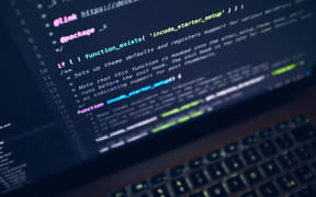 A generic computer screen with code displayed