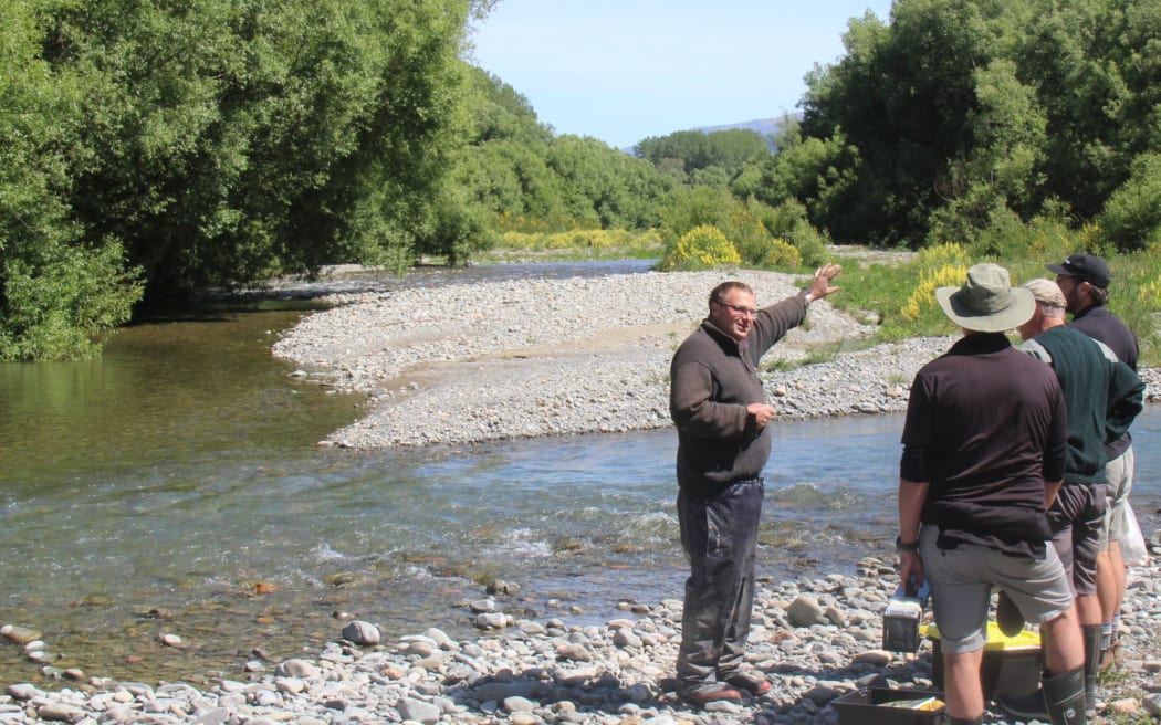 Chris Allen in his element at the confluence of Bowyers and Taylors Streams on his property during a recent Mid Canterbury Catchment Collective workshop on Stream Health Monitoring and Assessment. LDR SINGLE USE ONLY