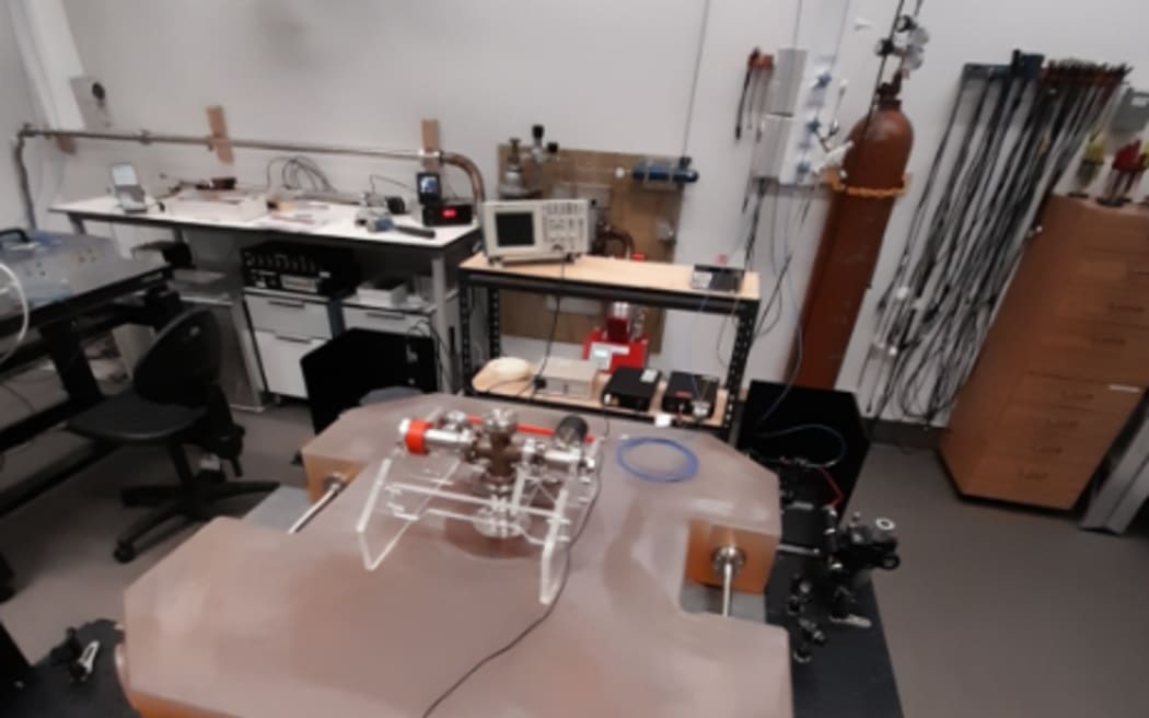 A (not very good) photo of a ring laser on a table.