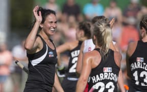 Black Sticks' Kayla Whitelock, left, and her team mates.