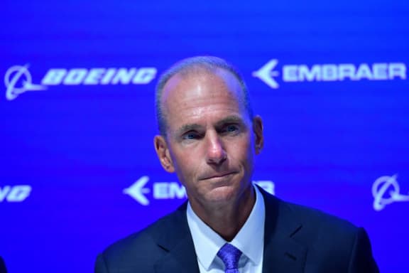 Boeing CEO, Dennis Muilenburg gestures during an event at the Farnborough Airshow, south west of London, on July 16, 2018. (Photo by Ben STANSALL / AFP)