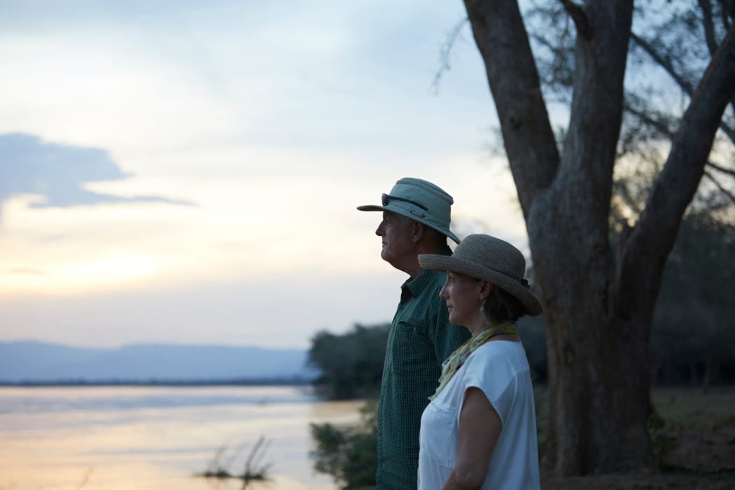 Tourists looking out to sea, Zambezi, Zambia (Photo by Michael Greenberg / Image Source / Image Source via AFP)