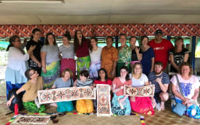 A group of educators on one of the malaga in Vaiafai Iva, Samoa