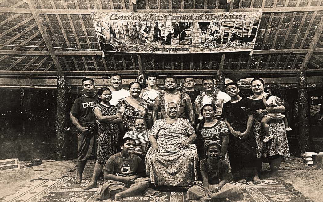 Anric and his family upon the completion of his tatau