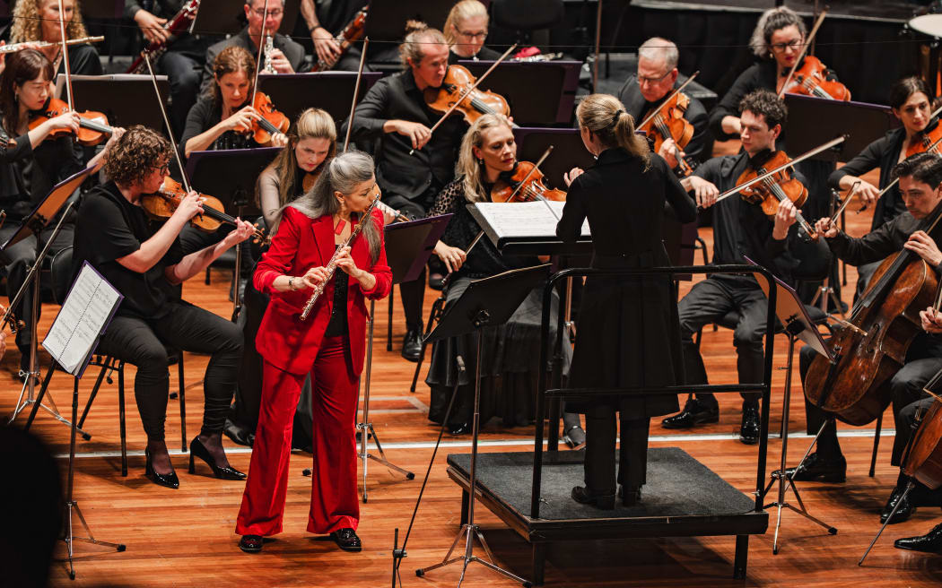 Flutist Emily Beynon performing with NZSO