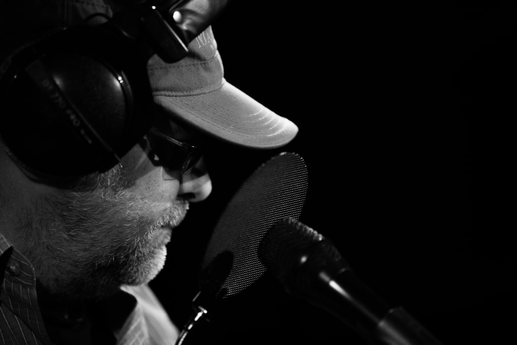 Musician and artsist Robert Scott in RNZ Auckland Studio B playing 'Little Bird'. 2 November 2018.