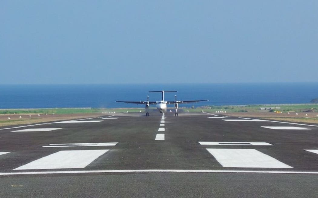 A plane lands on the upgraded runway at Hoskins airport in Papua New Guinea's West New Britain province.