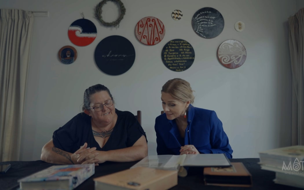 Ange McAllister showing Mata Reports' Mihingarangi Forbes family photos.