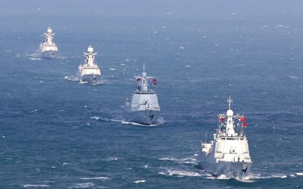 (221222) -- ABOARD DESTROYER JINAN, Dec. 22, 2022 (Xinhua) -- Warships of Chinese navy take part in a joint naval exercise, Joint Sea 2022, in the East China Sea on Dec. 21, 2022. Chinese and Russian navies on Wednesday kicked off a joint naval exercise, Joint Sea 2022, in the East China Sea. TO GO WITH "China, Russia hold joint naval exercise" (Photo by Xu Wei/Xinhua) (Photo by Xu Wei / XINHUA / Xinhua via AFP)