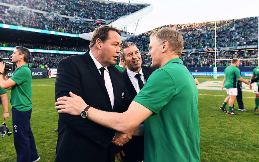 Steve Hansen and Wayne Smith congratulate Joe Schmidt after Ireland defeated the All Blacks for the first time 40-29.