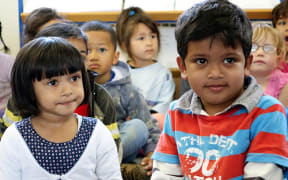 Children at Mt Roskill Kindergarten, where Child Poverty Action Group made the call for cross-party cooperation.