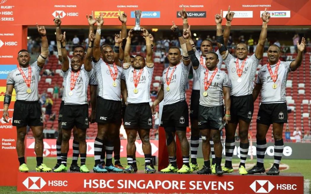 Fiji celebrate their Singapore Sevens win.