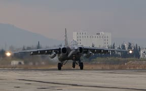 A Russian Sukhoi SU-34 bomber lands at a Russian military base in the northwest of Syria in December 2015.