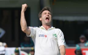 Ireland's Tim Murtagh celebrates after taking a wicket.