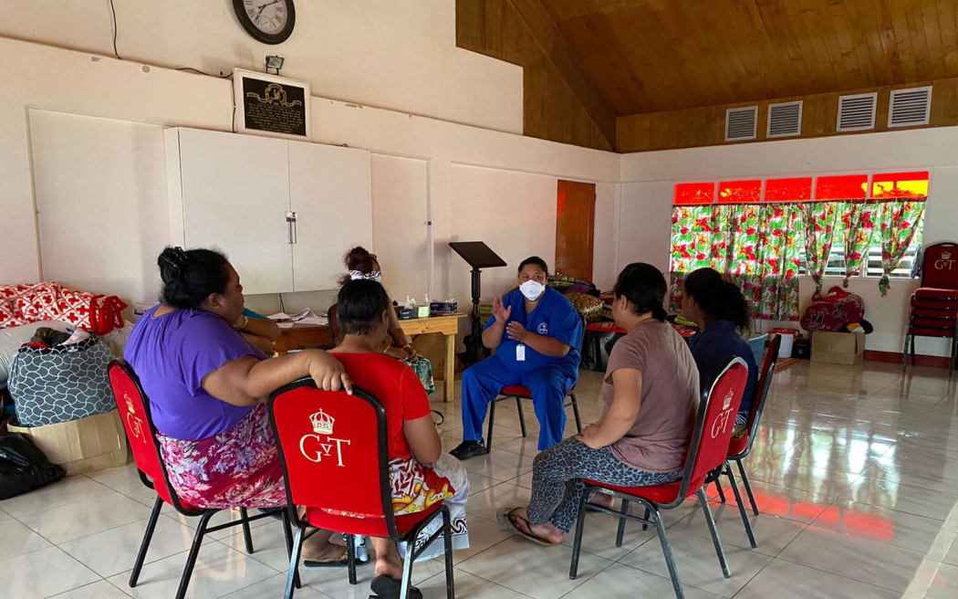 PACMAT nurse Seini Faleata in a therapy talk with women from Atata,