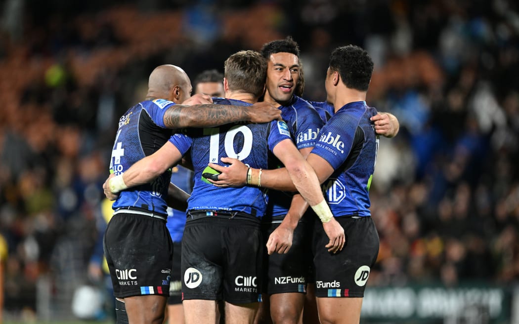 The Blues celebrate the win over the Chiefs.