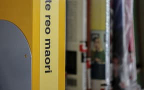 Yellow folder with Te Reo on the spine