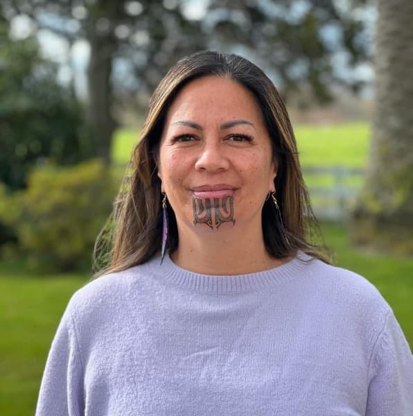 Kirsten Crawford (Ngāti Kauwhata, Ngāti Tukorehe) after receiving her moko kauae.
