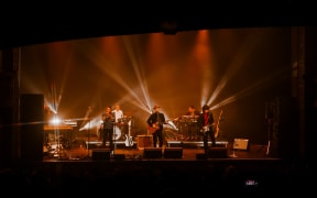 Calexico performing at the Wellington Opera House.