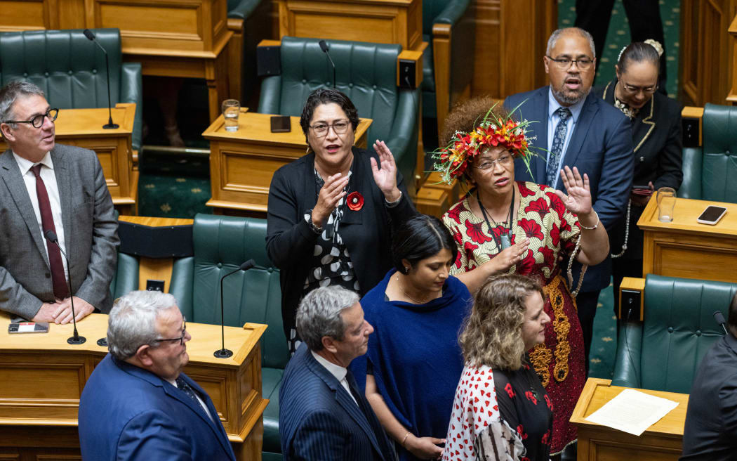 As MPs line up to farewell Jacinda Ardern after her valedictory, Labour MPs Anahila Kanongata'a-Suisuiki and Meka Whaitiri add some actions to the waiata that is resounding through the debating chamber.