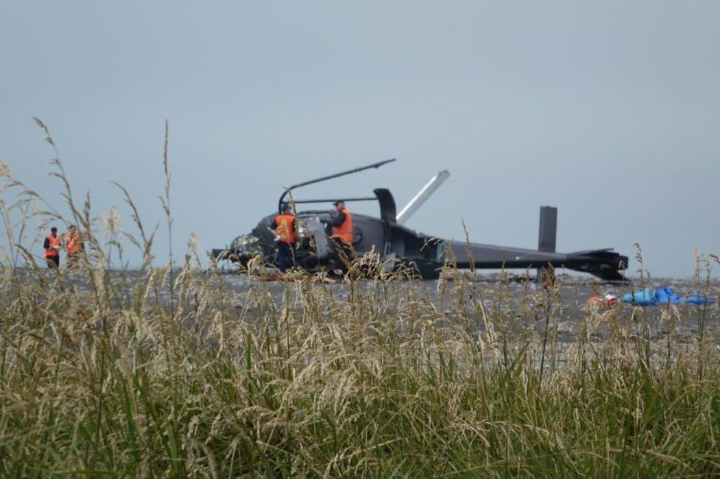 Accident inspectors at the helicopter crash site in Kekerengu.