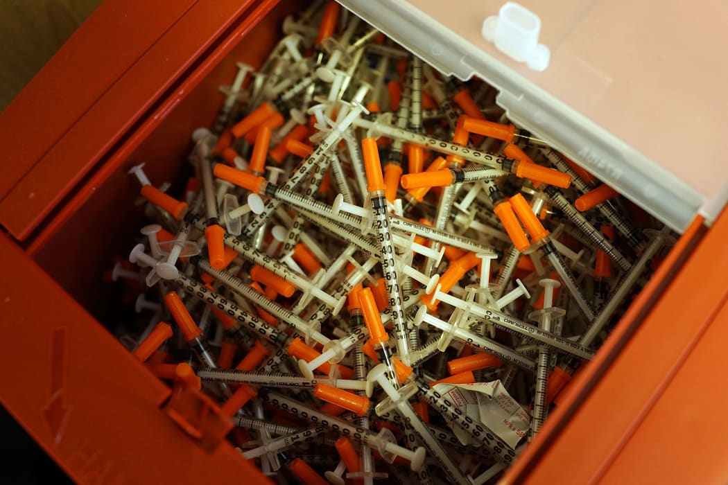 Used syringes at a needle exchange clinic in the US, where users can pick up new syringes and other clean items for those dependent on heroin (file photo)