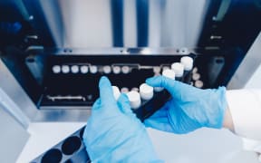 Sperm tubes are placed in bank to store genetic code, reproduction clones.