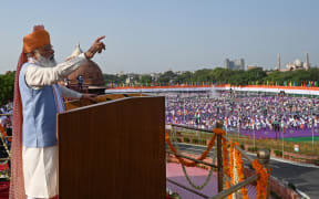 Indian Prime Minister Narendra Modi addresses the nation from the ramparts of the Red Fort during the celebrations to mark Indias 75th Independence Day in New Delhi on August 15, 2021.