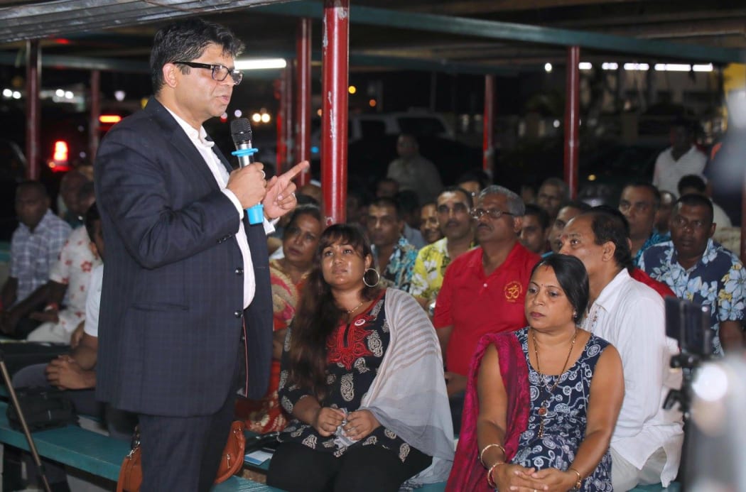 Fiji's Attorney General Aiyaz Sayed-Khaiyum addresses a public forum on the recent temple attacks