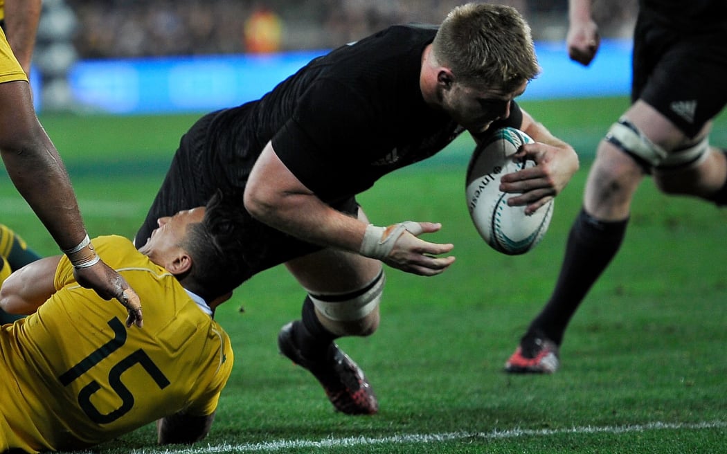 Sam Cane goes in for a try.