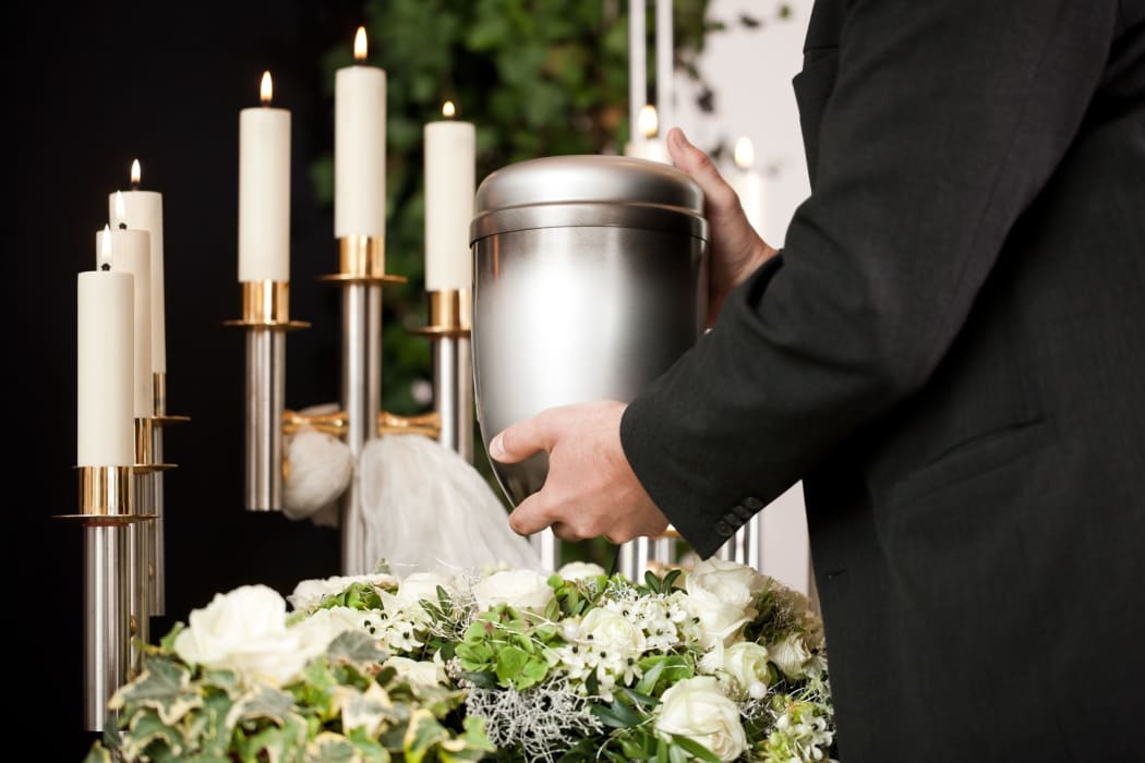 Funeral casket. Cremation urn.