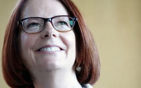 Julia Gillard signing copies of her book after speaking at the University of Auckland.