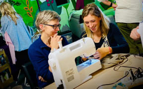 Sam Jay set up Stitch Up Society in New Plymouth to give people the skills to alter their own clothes.