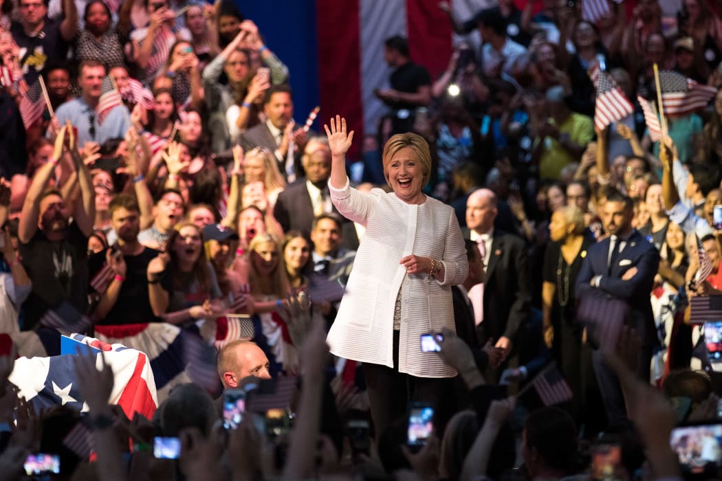 Democratic presidential candidate Hillary Clinton arrives onstage to deliver her victory speech.