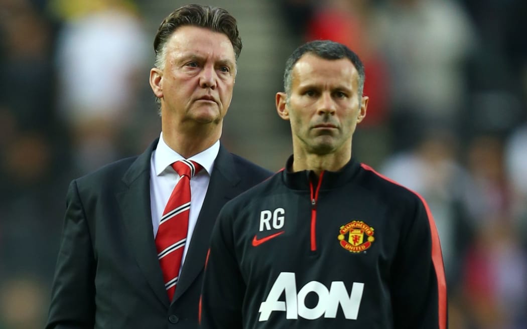 Louis van Gaal, Manager of Manchester United and assistant, Ryan Giggs. 2014.
